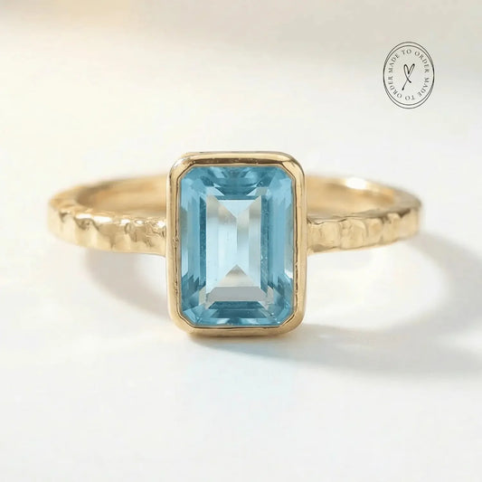 Tidewashed Sky Blue Topaz Ring – Octagonal Gemstone & Hammered Band